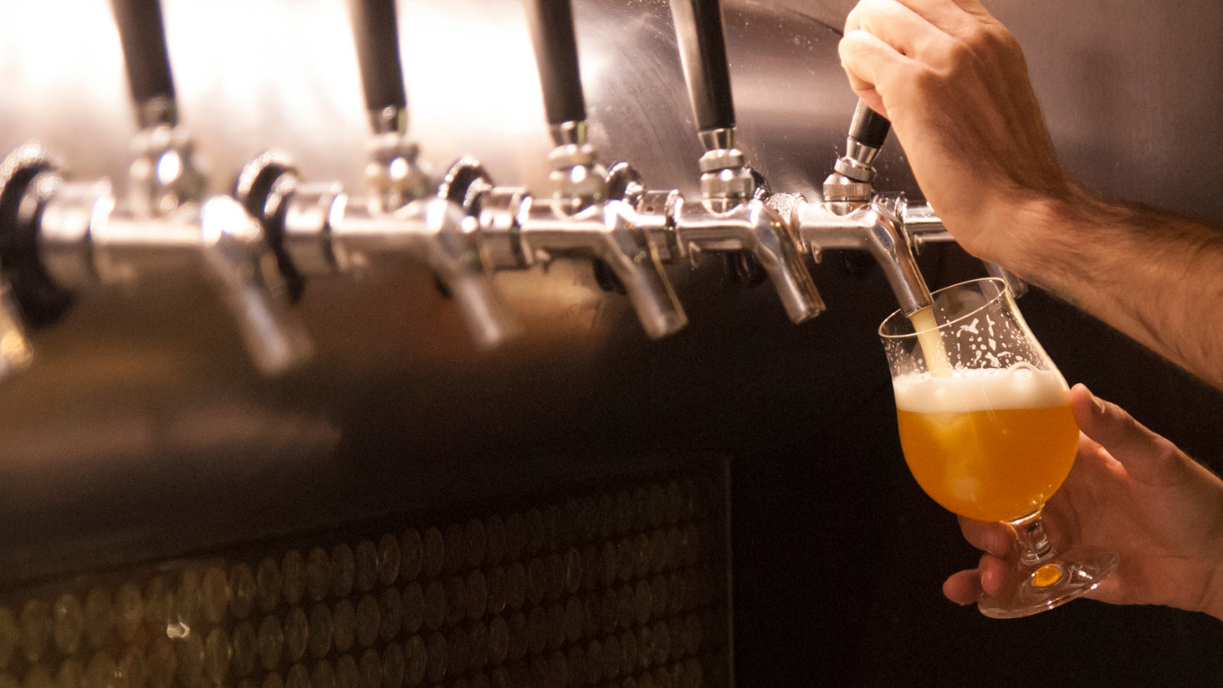 Beer taps at a pub bar