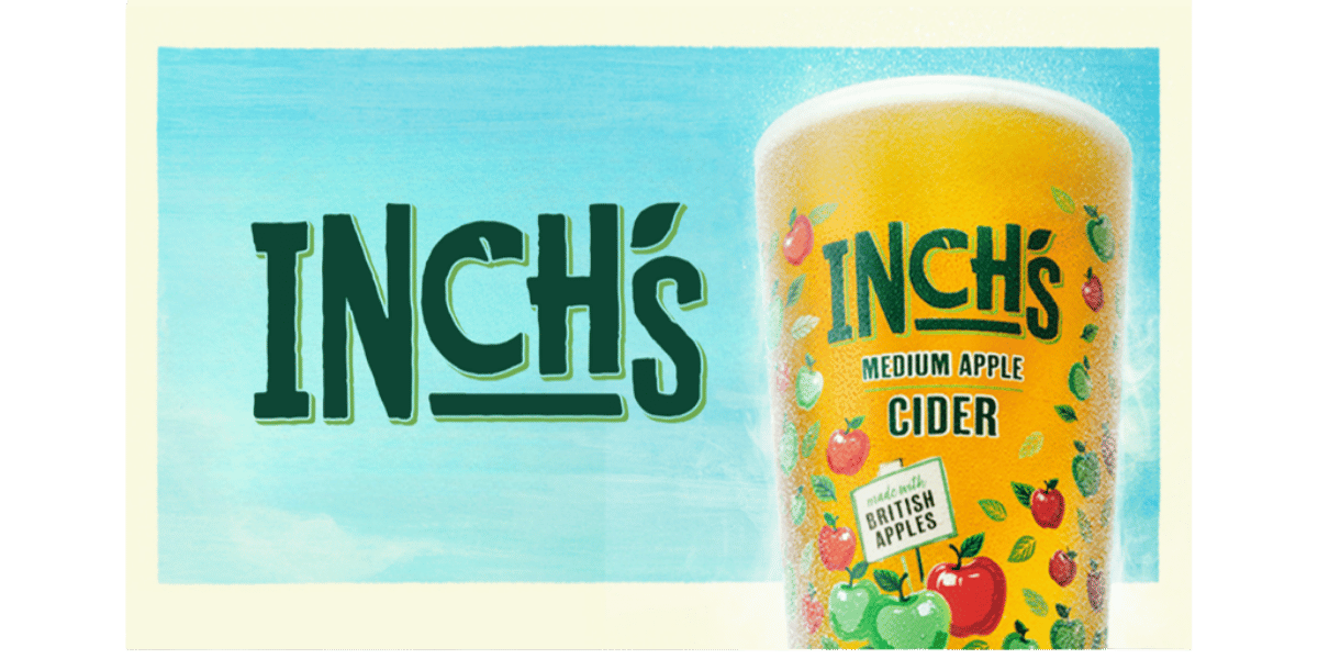 Inchs Cider in a glass on a blue sky background Inchs Cider in a glass on a blue sky background